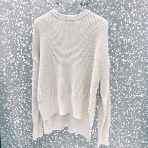 THE FRANKIE SHOP KNIT SWEATER TOP WITH UNEVEN HEM